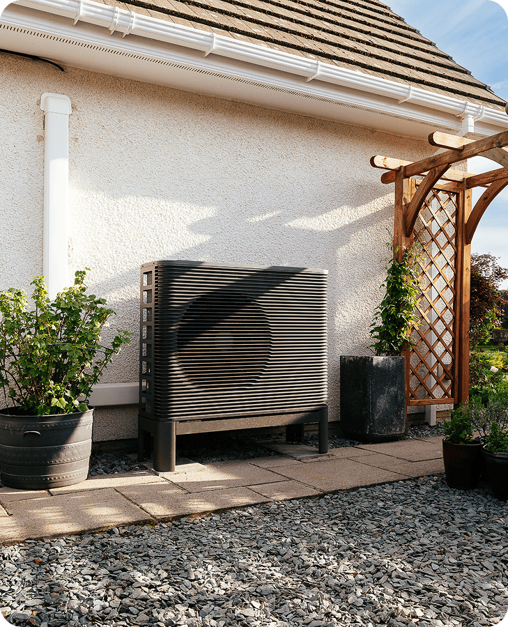 Aira Heat Pump in garden on sunny day